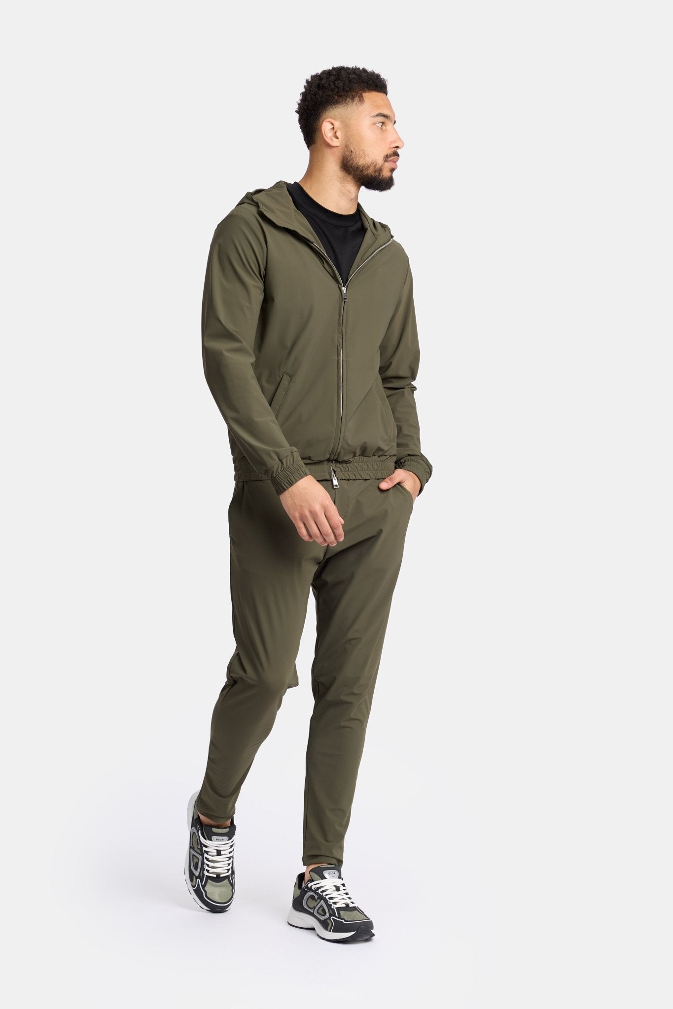 Manteau technique à capuche vert foncé Manteau technique à capuche vert foncé
