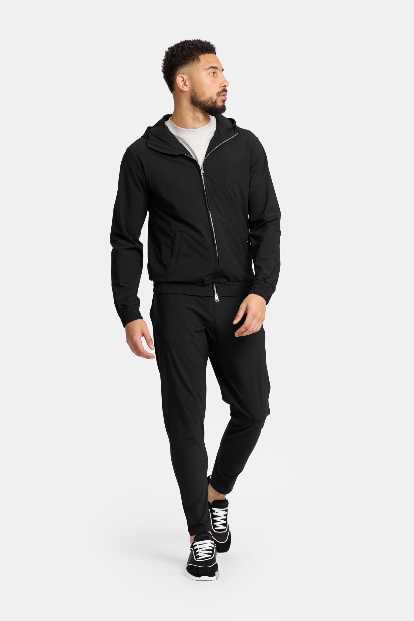Manteau technique à capuche noir onyx Manteau technique à capuche noir onyx
